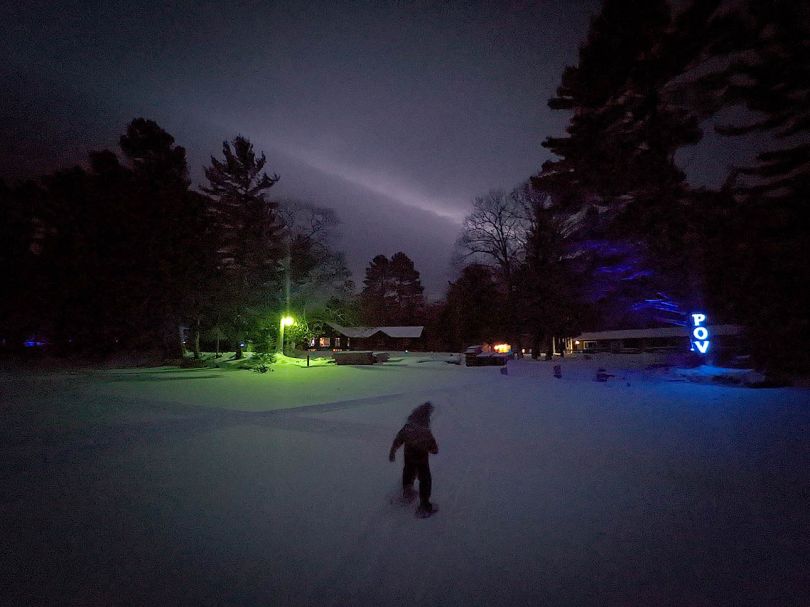Night time view Ice fishing at Coady's Point of View Resort